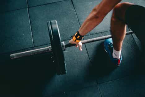 A man prepares to lift heavy weights